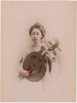 1780 Japan – A geisha playing the gekkin. Original Photograph / Photographer Unattributed