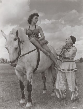 252 Kathryn Kramer Pretty Bareback Riding Star with Clown Jack LeClaire. Photographer Unknown
